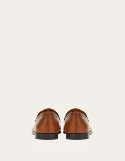 MOCCASIN WITH GANCINI ORNAMENT