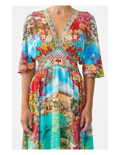 WAISTED DRESS WITH HEM RUFFLE