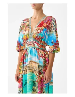 WAISTED DRESS WITH HEM RUFFLE